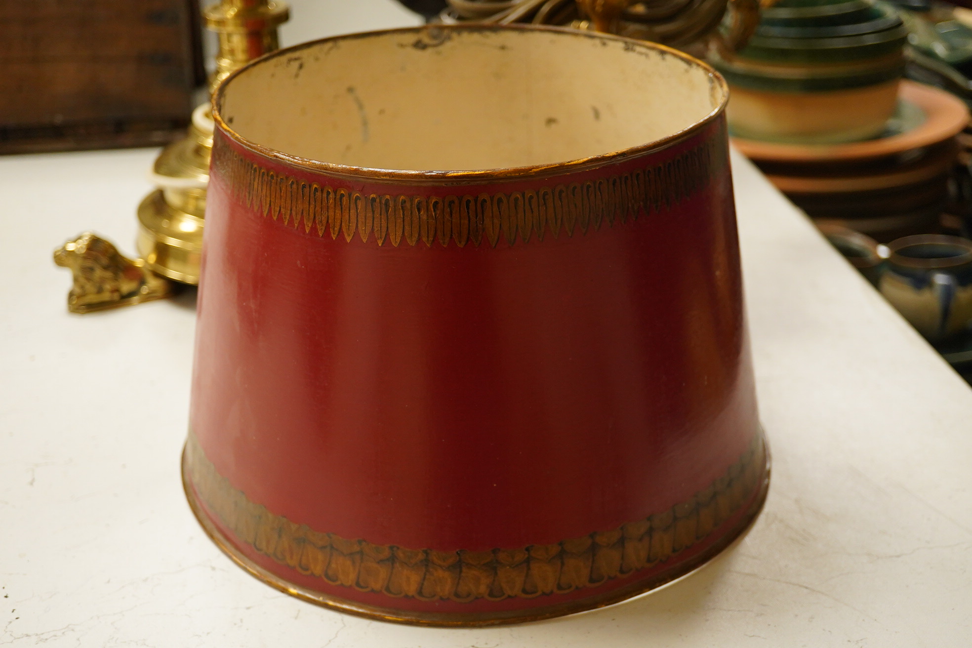 A plaster library bust possibly Keats?, an ormolu three light table lamp with red tole shade, 63cm high, and a large brass candlestick lamp on lion feet. Condition - fair to good